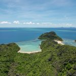 Îlot bordé d'un banc de sable blanc dans les eaux turquoise du Nord de Madagascar
